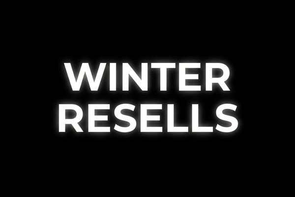 winter resells in a white font and glowing in a black background 